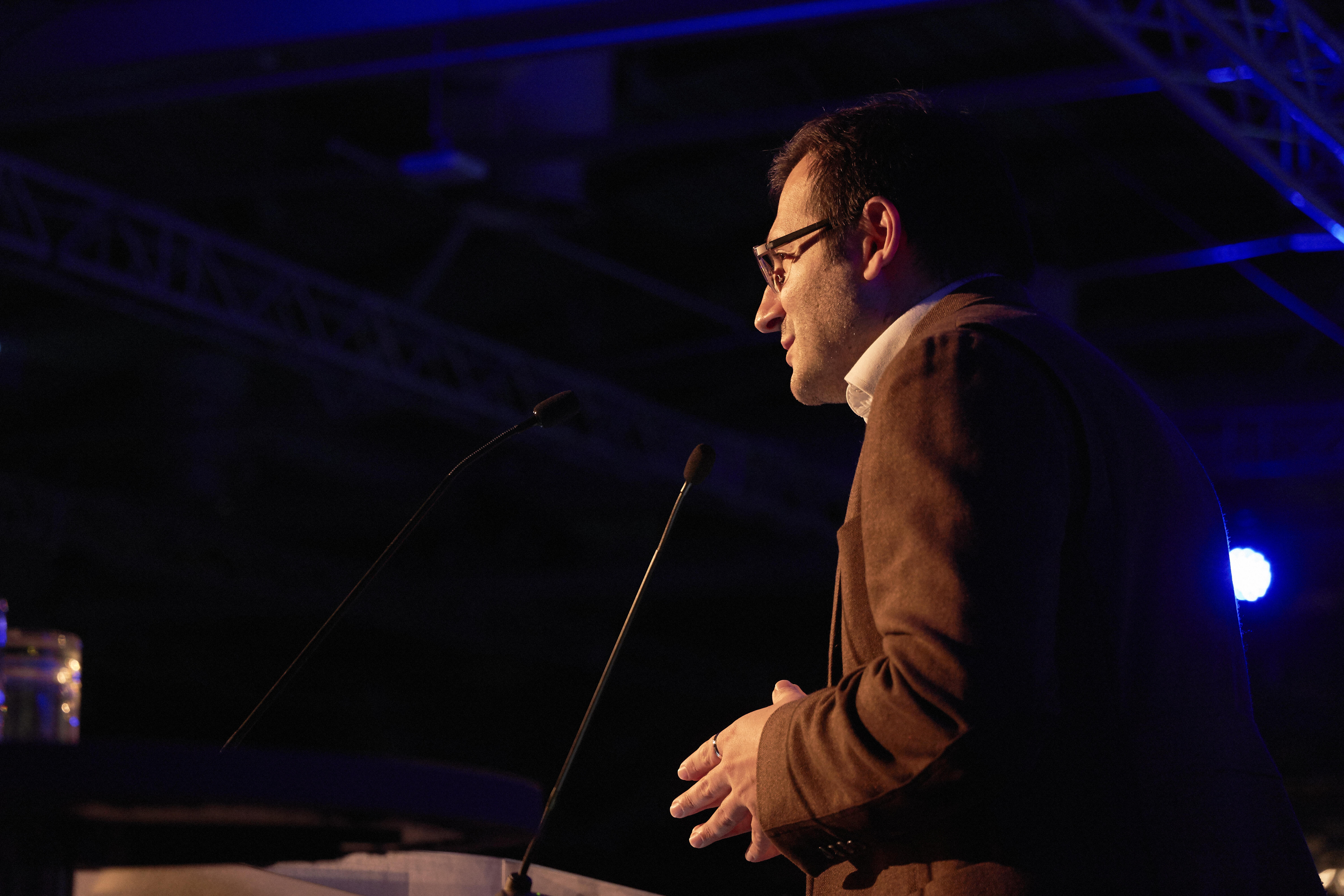 Anrea Raballo standing from behind