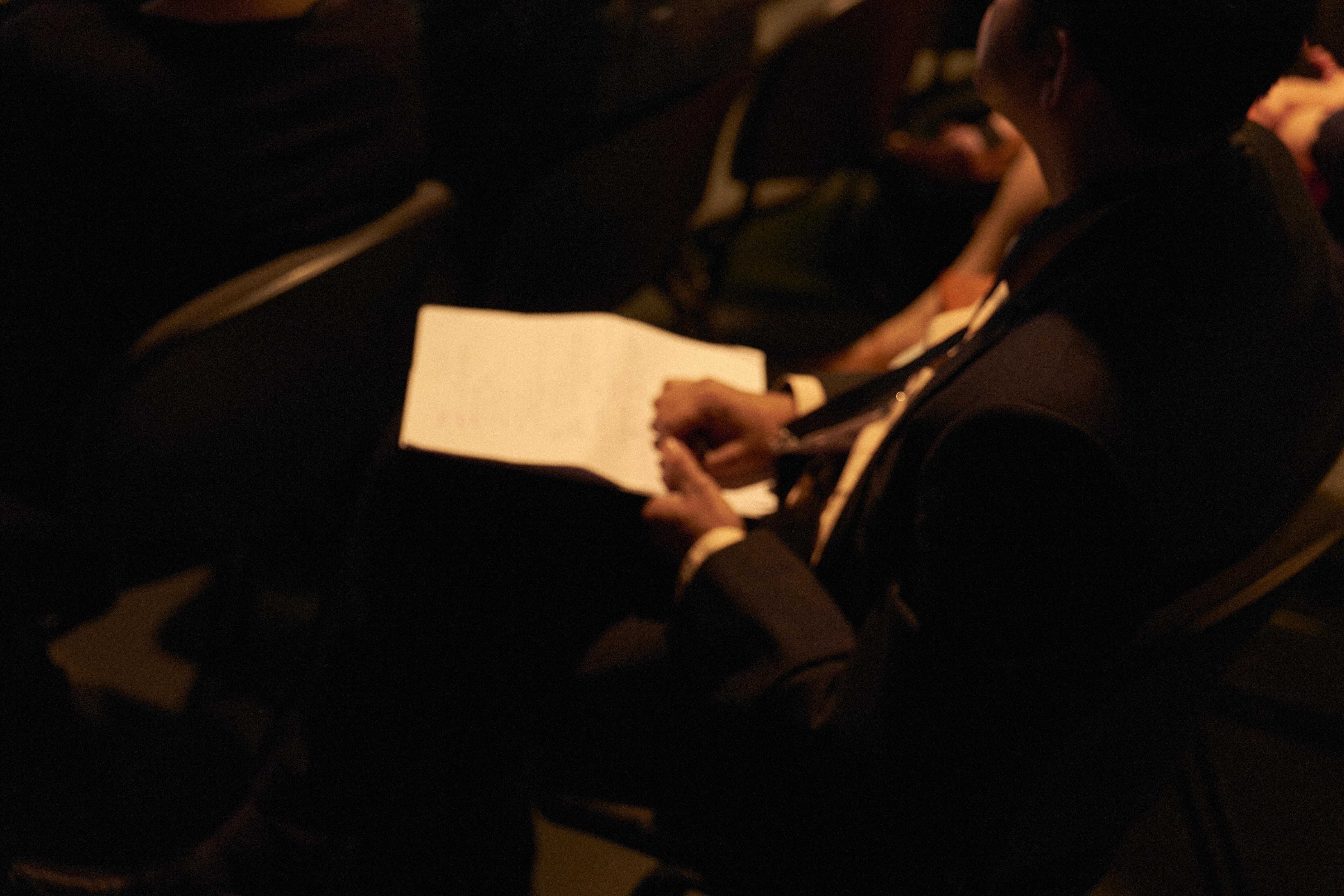 Audience taking notes